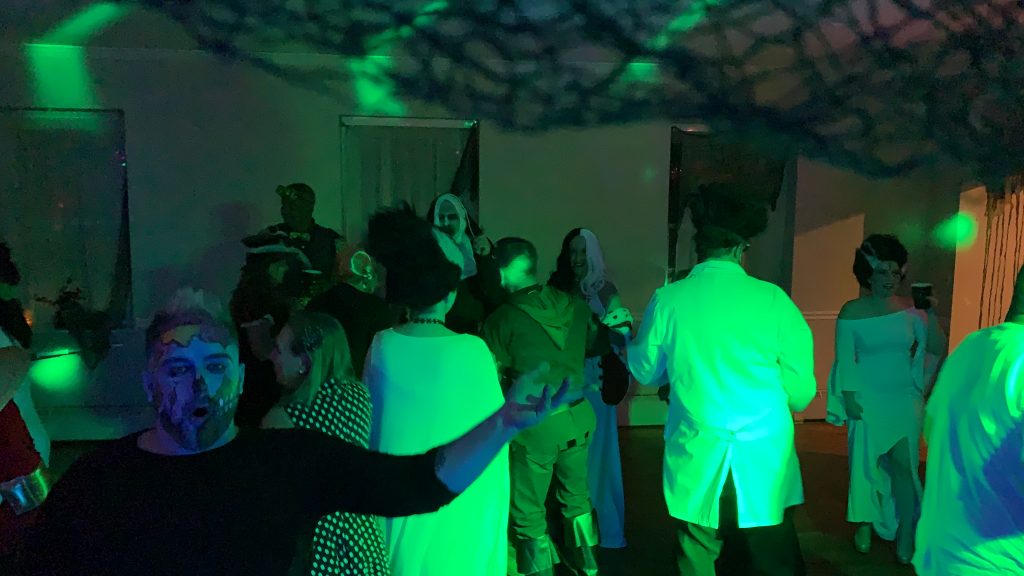 Happy people dancing at a party